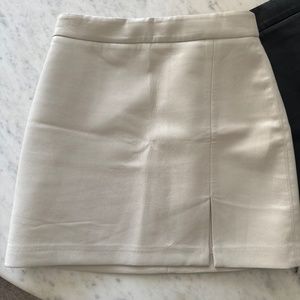 Two High-waisted Vegan Leather mini skirts